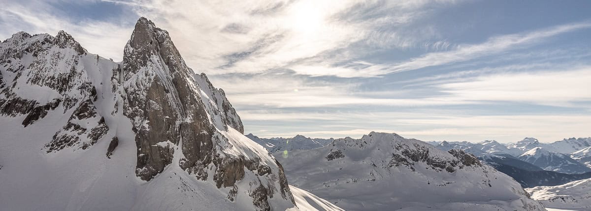 A stunning winter mountain panorama in the Arlberg region near St. Anton, Lech Zürs. Fresh snow, cold temperatures, and ideal conditions for off-piste skiing with Piste to Powder’s expert guides.
